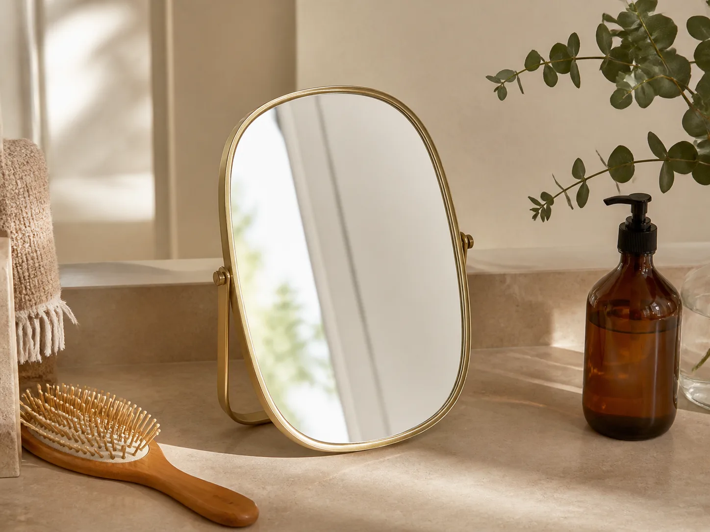Minimal arched tabletop mirror in warm natural light